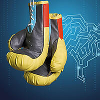 Zwei Boxhandschuhe vor einem Hintergrund mit digitalen Vernetzungen