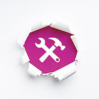 Symbol mit Hammer und Schraubenschlüssel